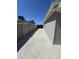 The side yard is paved and ready for use at 1627 W Pueblo Ave, Mesa, AZ 85202