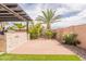 Backyard with brick paving and a built-in barbecue for outdoor enjoyment at 16781 W Northampton Rd, Surprise, AZ 85374