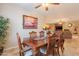 Dining room with a view into the living room at 16781 W Northampton Rd, Surprise, AZ 85374