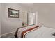 Comfortable bedroom with soft carpet, neutral walls, ceiling fan, and a peaceful ambiance at 16803 N 49Th Way, Scottsdale, AZ 85254