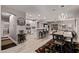 Spacious open-concept living space features wood floors, dining area, and modern kitchen at 16803 N 49Th Way, Scottsdale, AZ 85254
