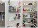 Well-organized pantry with wire racks and shelving offers plenty of storage space for food and supplies at 16803 N 49Th Way, Scottsdale, AZ 85254
