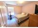 Inviting bedroom with a comfortable bed, natural light, and a decorative table at 17257 W Papago St, Goodyear, AZ 85338