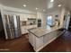 Bright and open kitchen featuring a large island, stainless appliances, and ample cabinet space at 1742 W Butler Dr, Phoenix, AZ 85021