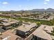 Expansive aerial view showcasing the community's layout and nearby mountain views at 17850 N 68Th St # 1017, Phoenix, AZ 85054