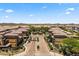 Inviting community entrance with lush landscaping, providing a welcoming and serene ambiance for residents at 17850 N 68Th St # 1017, Phoenix, AZ 85054
