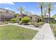 The community clubhouse has a grassy lawn and sidewalk at 17850 N 68Th St # 1017, Phoenix, AZ 85054