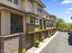 Beautiful townhouse exterior with attached garages and private balconies at 17850 N 68Th St # 1017, Phoenix, AZ 85054