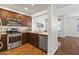 Well-equipped kitchen with stainless steel appliances, wood cabinets, and an open layout at 17850 N 68Th St # 1017, Phoenix, AZ 85054