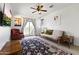 Comfortable living room with ample natural light, ceiling fan, seating area and stylish decor at 17850 N 68Th St # 1017, Phoenix, AZ 85054