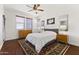 Bright bedroom with modern decor, a comfortable bed, and stylish accents at 17850 N 68Th St # 1017, Phoenix, AZ 85054