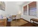 Bright office space featuring a desk, rug, hardwood floors, and a window, perfect for a productive work environment at 17850 N 68Th St # 1017, Phoenix, AZ 85054