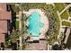 Relaxing pool and spa area surrounded by palm trees, offering a serene and luxurious oasis at 17850 N 68Th St # 1017, Phoenix, AZ 85054
