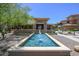 Community clubhouse entrance with a refreshing water feature, surrounded by lush landscaping and inviting architecture at 20100 N 78Th Pl # 2019, Scottsdale, AZ 85255