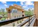 Stunning multi-story condo with large windows and mature landscaping viewed from balcony at 20100 N 78Th Pl # 2019, Scottsdale, AZ 85255