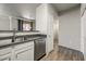 Well-appointed kitchen featuring stainless steel appliances and a convenient breakfast bar at 20100 N 78Th Pl # 2019, Scottsdale, AZ 85255
