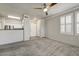 Open-concept living space boasts neutral decor and seamlessly connects to the adjacent kitchen area at 20100 N 78Th Pl # 2019, Scottsdale, AZ 85255