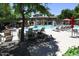 Inviting community pool with sun loungers, umbrellas, and beautiful landscaping offers a relaxing outdoor retreat at 20100 N 78Th Pl # 2019, Scottsdale, AZ 85255