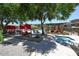 Resort-style pool area with cabanas, lounge chairs, mature trees and lush landscaping at 20100 N 78Th Pl # 2019, Scottsdale, AZ 85255