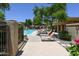 Community pool area with plenty of lounge seating and shade, offering a refreshing escape in a well-maintained environment at 20100 N 78Th Pl # 2019, Scottsdale, AZ 85255