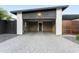 Spacious two-car garage with brick walls and modern door, perfect for storage and parking at 2215 N 38Th Way, Phoenix, AZ 85008