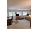 Bedroom featuring a daybed, desk, and ample natural light at 2233 E Behrend Dr # 121, Phoenix, AZ 85024