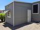 This property features a well-maintained exterior with neutral siding and gravel landscaping at 2233 E Behrend Dr # 121, Phoenix, AZ 85024
