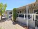 Charming home featuring a welcoming front porch with inviting outdoor space at 2233 E Behrend Dr # 121, Phoenix, AZ 85024