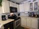 Kitchen with stainless steel appliances, countertops, and plenty of cabinet space at 2233 E Behrend Dr # 121, Phoenix, AZ 85024