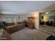 Spacious living room featuring comfortable daybed and ample space at 2233 E Behrend Dr # 121, Phoenix, AZ 85024