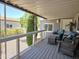 Inviting covered porch with comfortable seating, offering a relaxing outdoor space and neighborhood views at 2233 E Behrend Dr # 121, Phoenix, AZ 85024