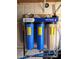 Whole house water filtration system featuring three filter housings with gauges for pure water at 2233 E Behrend Dr # 121, Phoenix, AZ 85024