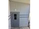 Back door with gray siding offers a functional outdoor space at 2233 E Behrend Dr # 17, Phoenix, AZ 85024