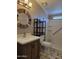Bathroom featuring a wooden framed mirror, sink, toilet, and shower at 2233 E Behrend Dr # 17, Phoenix, AZ 85024