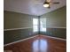 The bedroom offers natural light and ample space, complemented by a ceiling fan at 2233 E Behrend Dr # 17, Phoenix, AZ 85024