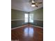 The bedroom offers natural light and ample space, complemented by a ceiling fan at 2233 E Behrend Dr # 17, Phoenix, AZ 85024