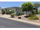 Manicured yard and charming exterior of this lovely mobile home at 2233 E Behrend Dr # 17, Phoenix, AZ 85024