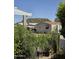 Charming home with desert landscaping, including cacti, rocks, and other foliage at 2233 E Behrend Dr # 17, Phoenix, AZ 85024