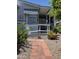 Inviting walkway with brick pavers leads to a cozy covered porch at 2233 E Behrend Dr # 17, Phoenix, AZ 85024