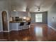 View of an open living space and kitchen with bar seating at 2233 E Behrend Dr # 17, Phoenix, AZ 85024