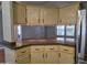Kitchen with a breakfast bar and stainless steel refrigerator at 2233 E Behrend Dr # 17, Phoenix, AZ 85024