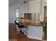 Kitchen bar with granite countertops and pendant lighting at 2233 E Behrend Dr # 17, Phoenix, AZ 85024
