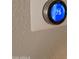 Image of the Nest smart thermostat set to 75 degrees at 2233 E Behrend Dr # 17, Phoenix, AZ 85024