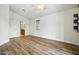 A bedroom featuring stylish wood laminate flooring and a ceiling fan for added comfort at 2402 E 5Th St # 1649, Tempe, AZ 85288
