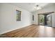 Well-lit bedroom with wood floors and balcony access at 2402 E 5Th St # 1649, Tempe, AZ 85288