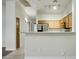Bright kitchen features stainless steel appliances and a breakfast bar for casual dining at 2402 E 5Th St # 1649, Tempe, AZ 85288