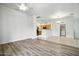 Bright living room with tile and wood flooring seamlessly connects to the kitchen at 2402 E 5Th St # 1649, Tempe, AZ 85288