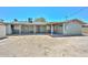 This backyard features a covered patio and desert landscaping at 2922 W Citrus Way, Phoenix, AZ 85017