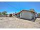 This backyard features a utility shed, covered patio, and desert landscaping at 2922 W Citrus Way, Phoenix, AZ 85017