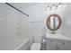A bathroom featuring a shower-tub combo, toilet, sink, mirror and vanity at 2922 W Citrus Way, Phoenix, AZ 85017